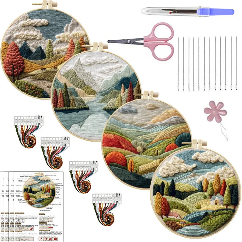 DIY landscape embroidery kit with cotton fabric, bamboo frame, threads and needles arranged for crafting