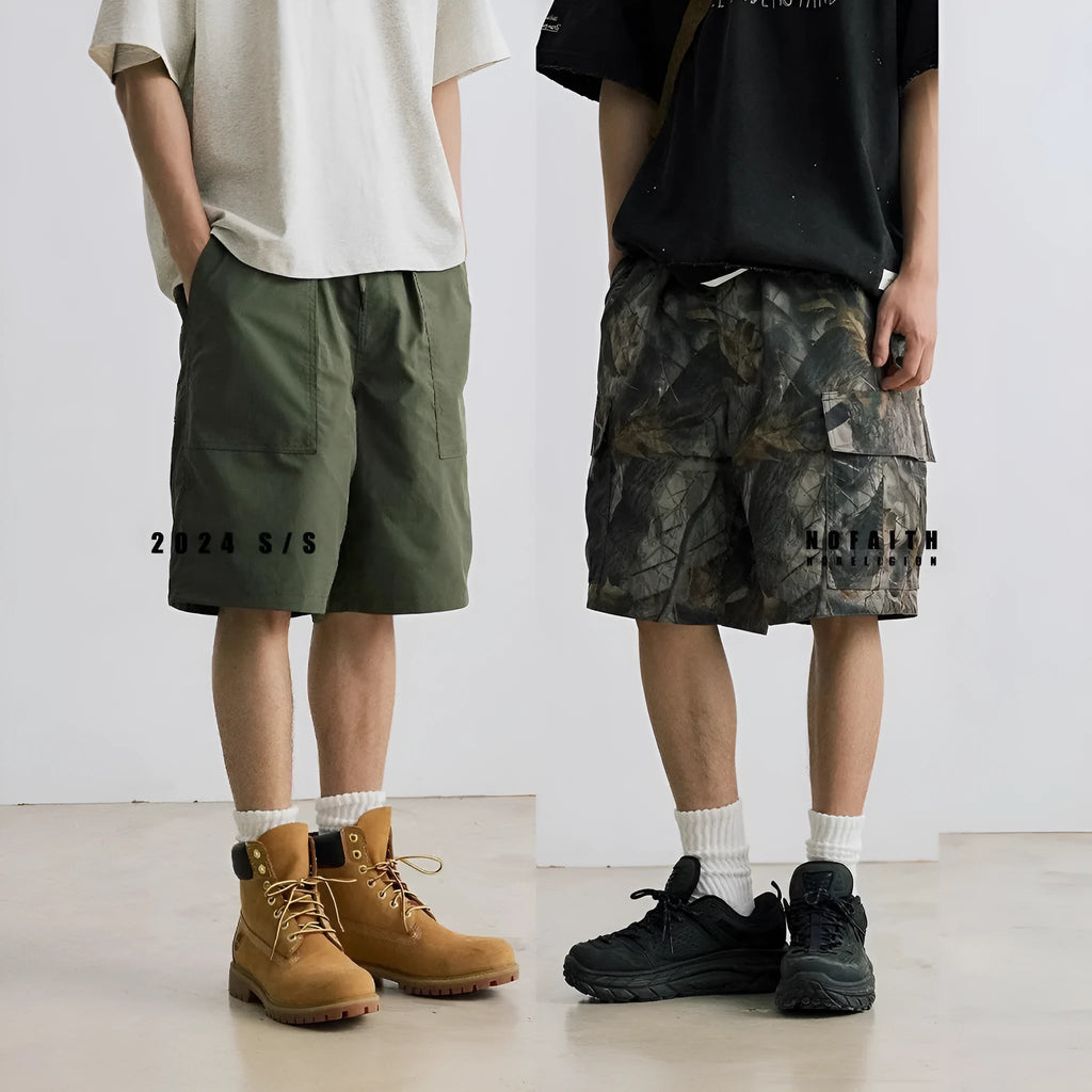Loose fit denim shorts in army green with a straight leg and elastic waistband.
