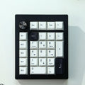 Wireless mechanical numeric keyboard with Bluetooth connectivity in black finish showing numeric keypad layout