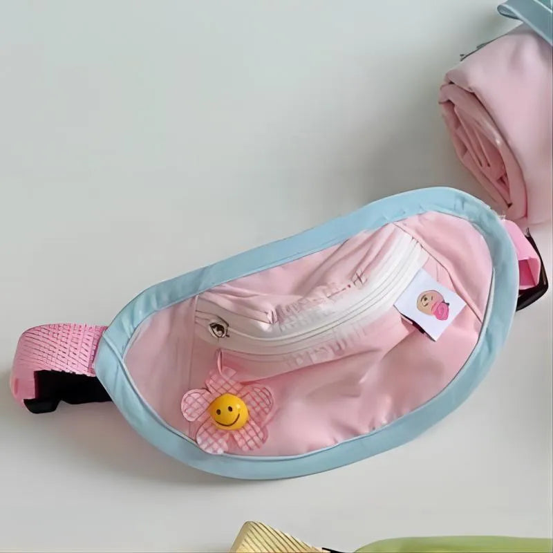 Powder blue backpack-style dog poop bag dispenser clipped to a harness.