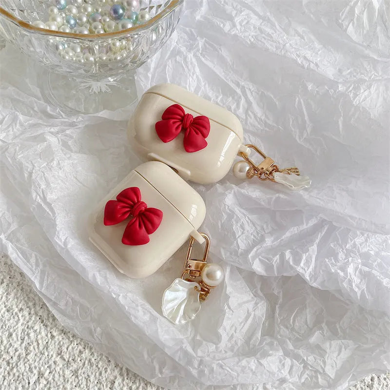 Beige red tpu protective case for AirPods Pro with a bow design on the shell.