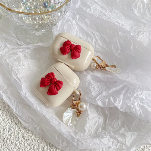 Beige red tpu protective case for AirPods Pro with a bow design on the shell.