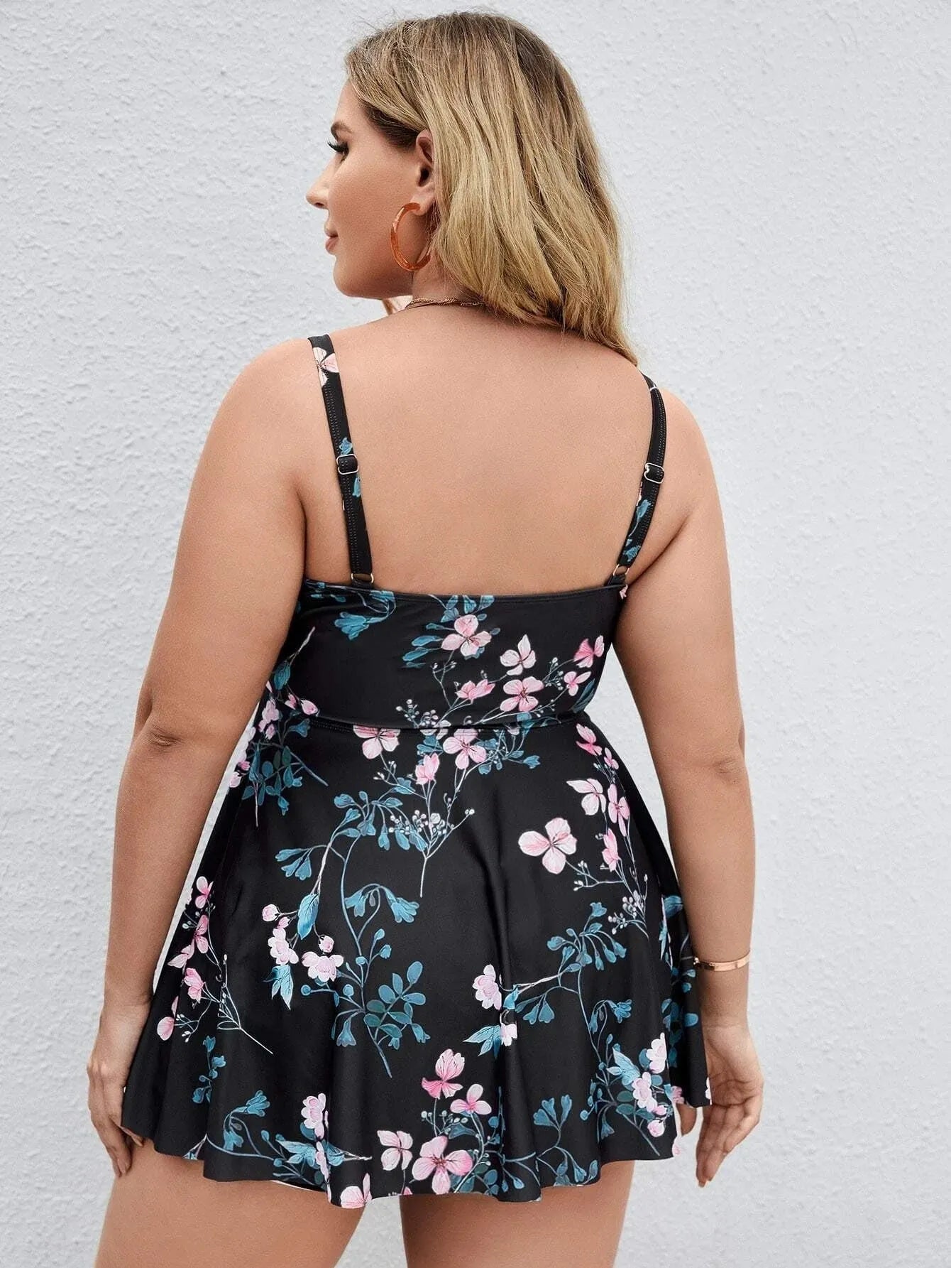 Women's plus size floral print one-piece swimsuit in split colour design.
