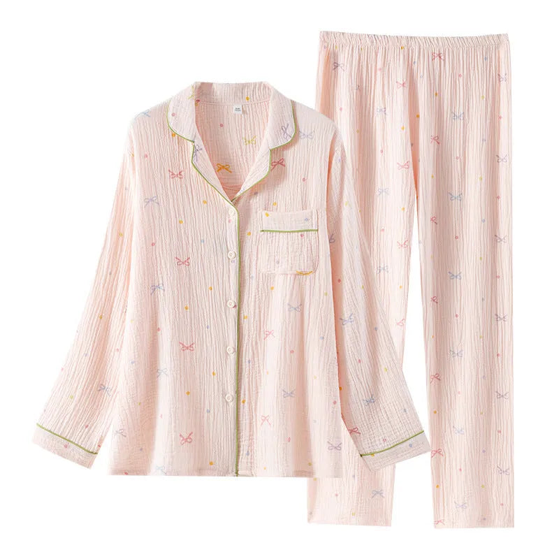 Women's beige cotton pajama suit with long sleeves and trousers for homewear.