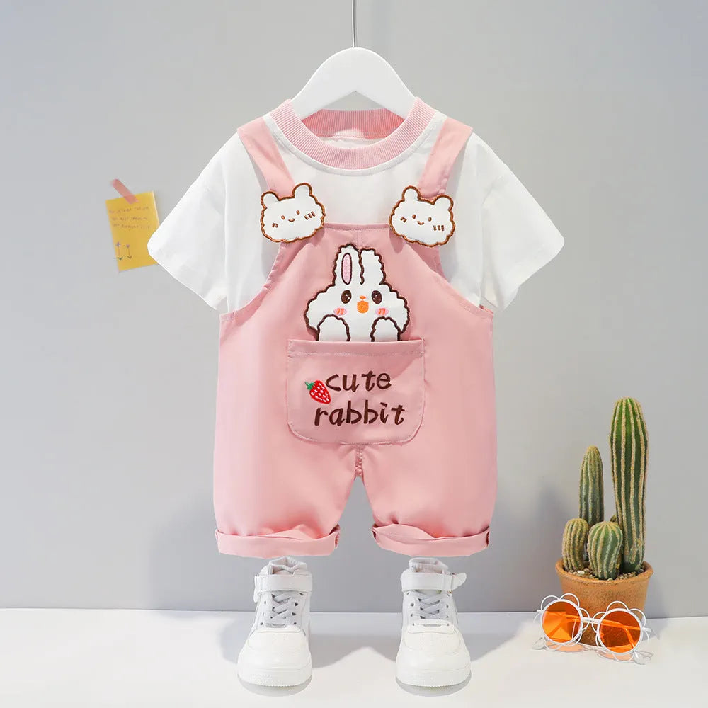 Yellow children's cotton short-sleeved overalls with cartoon print and detachable straps.