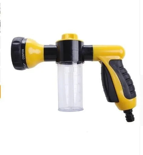 Green high pressure foam spray gun with adjustable nozzle for car washing and household cleaning.