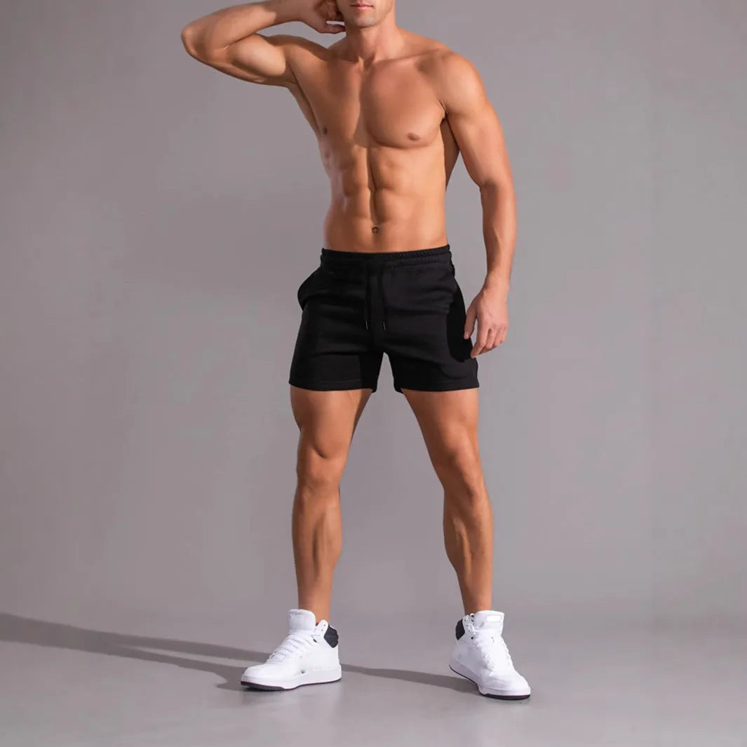 Men's 3-piece drawstring shorts set in black, khaki, and light brown colours showing loose fit design