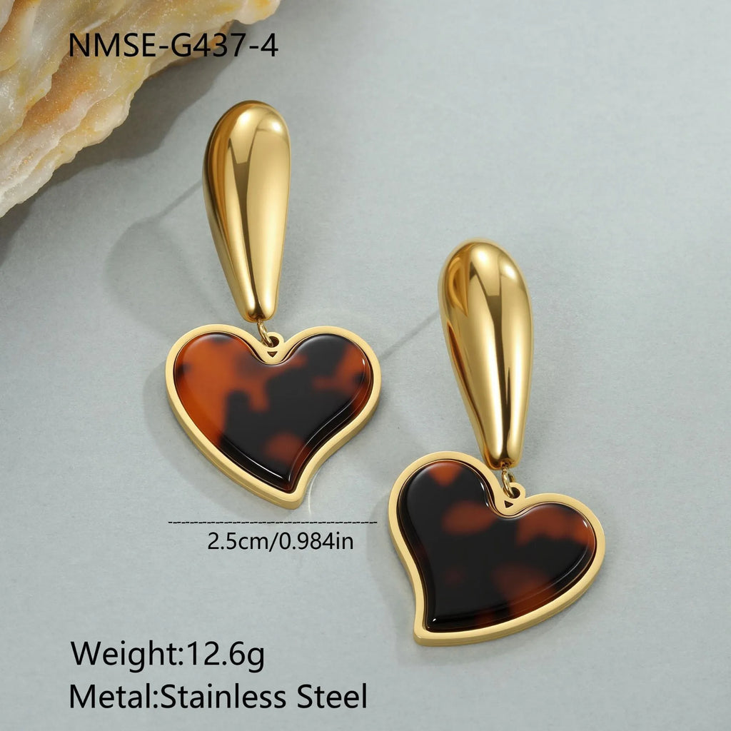 Women's tortoiseshell resin finish earrings with heart or flower designs in 18K gold electroplated stainless steel