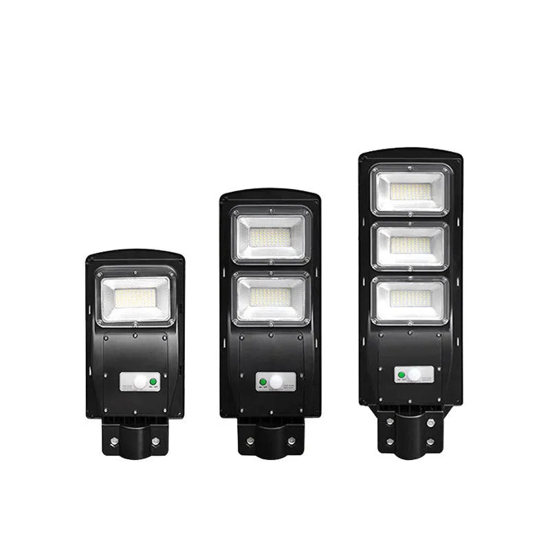Integrated solar-powered street light with LED panel and remote control for outdoor use.