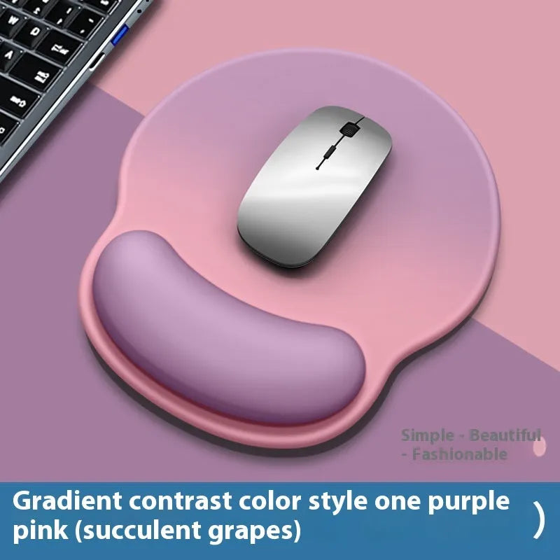 Silicone mouse mat with wrist rest in gradient colour pattern on desk