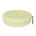 Portable outdoor dog food and water bowl with attached snack box in light pink and green colours.