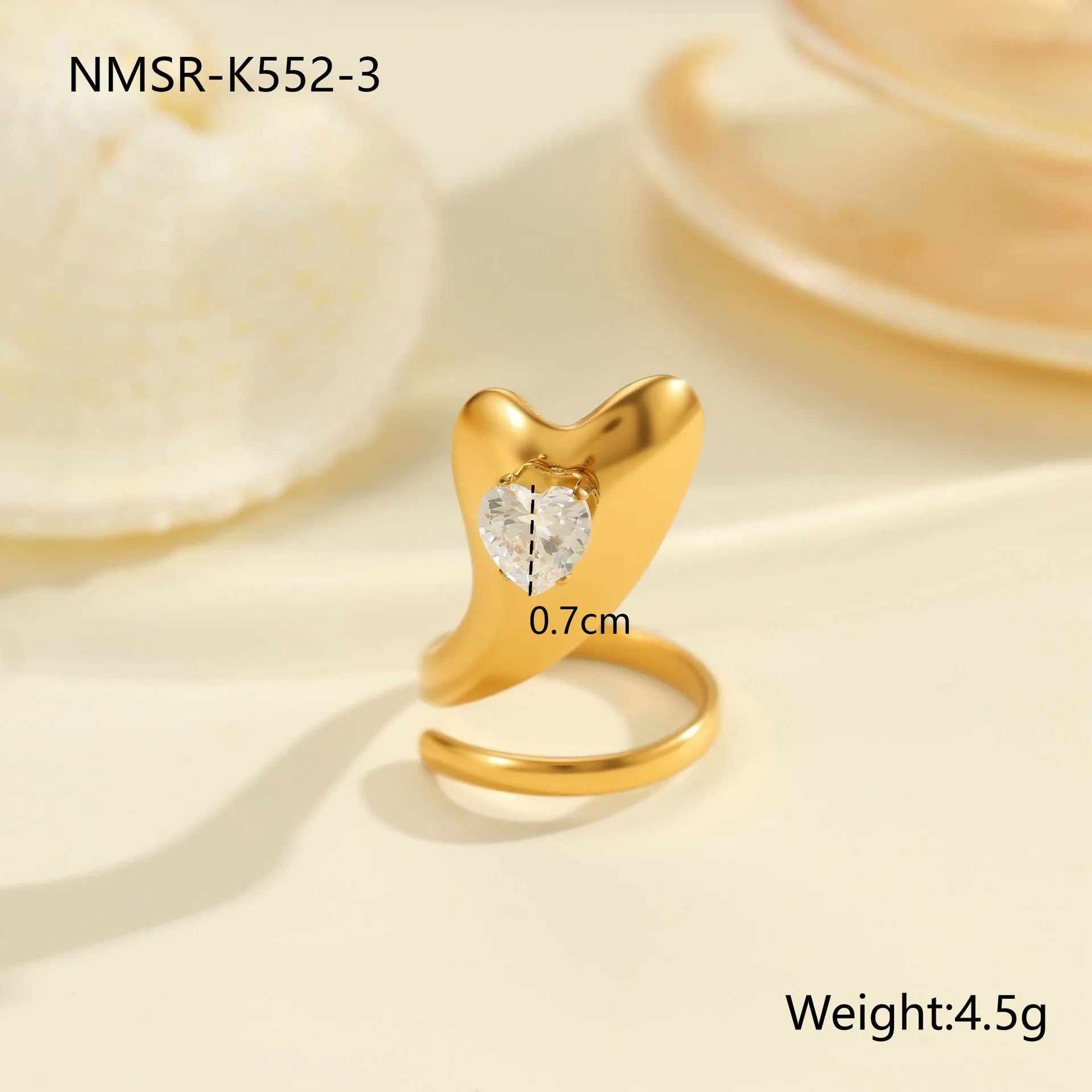 Geometric stainless steel zircon ring with open mouth design showing round, oval and quadrangle elements