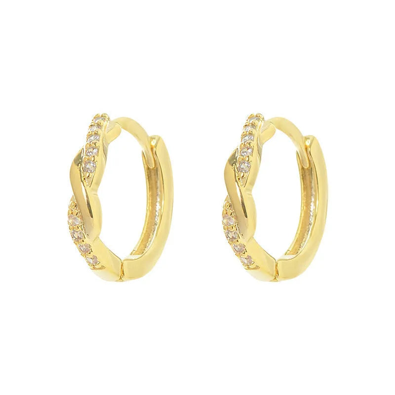Interwoven hemp rope earrings with geometrical round shape in gold and silver colours