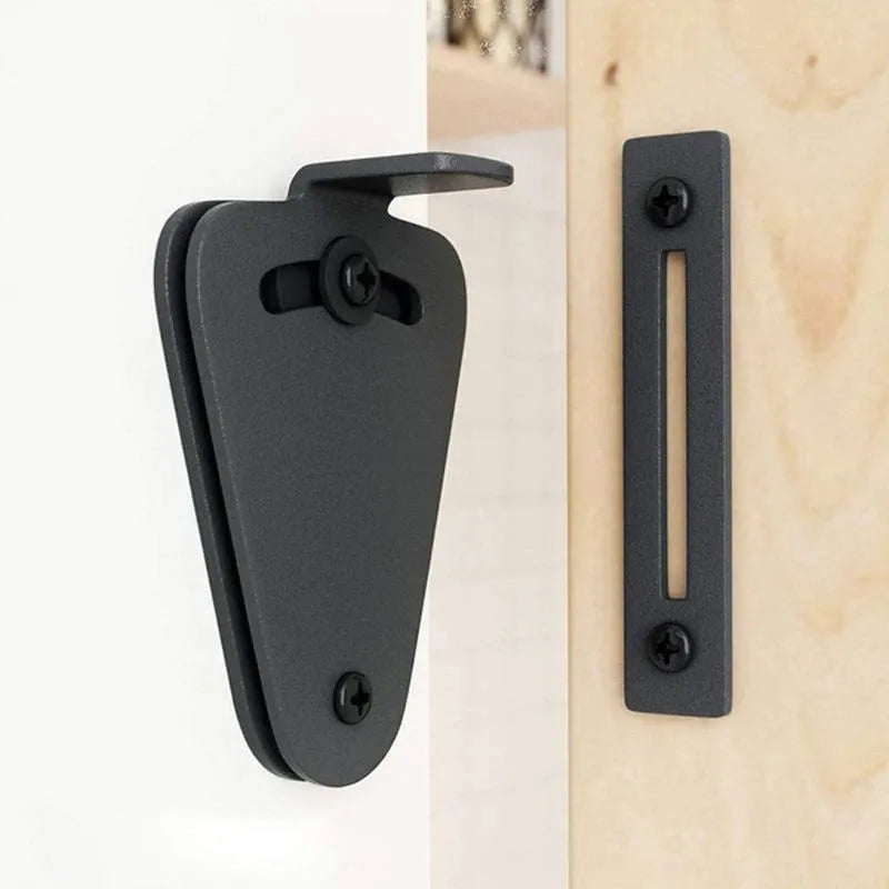 Black stainless steel sliding barn door lock shown in S and M sizes for different door gaps