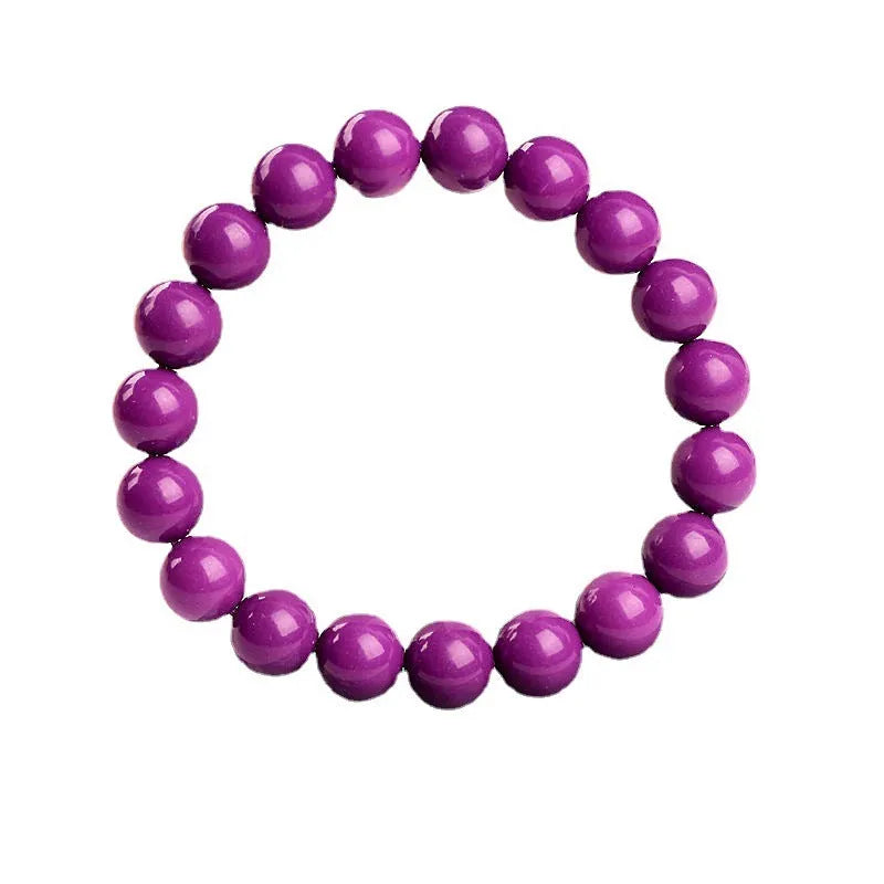 Genuine crystal bracelet with purple mica colour in a single circle design on a wrist.