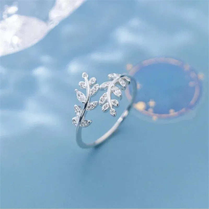 Women's copper branch ring with leaf design in silver or gold electroplated finish
