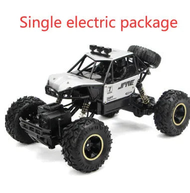 Black and silver remote control climbing cars with 2.4G wireless controller on a rough surface.