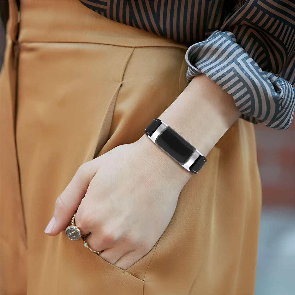 Genuine leather watch strap for Fitbit Charge 5 and Charge 6 fitness trackers on a wrist.