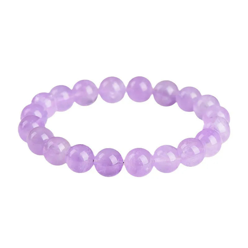 Lavender round amethyst bead bracelet with water ripple design on a cream body and transparent lavender beads.