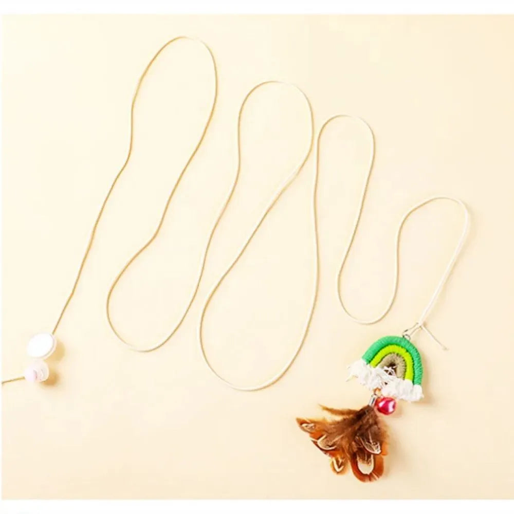 Colourful feather cat rope toy hanging from a door with elastic swing and sticky buckle clamp