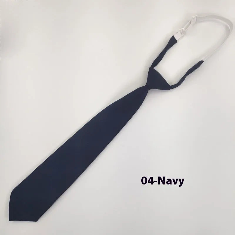 Men's solid colour cotton bow tie in arrow style, showing navy blue colour option.