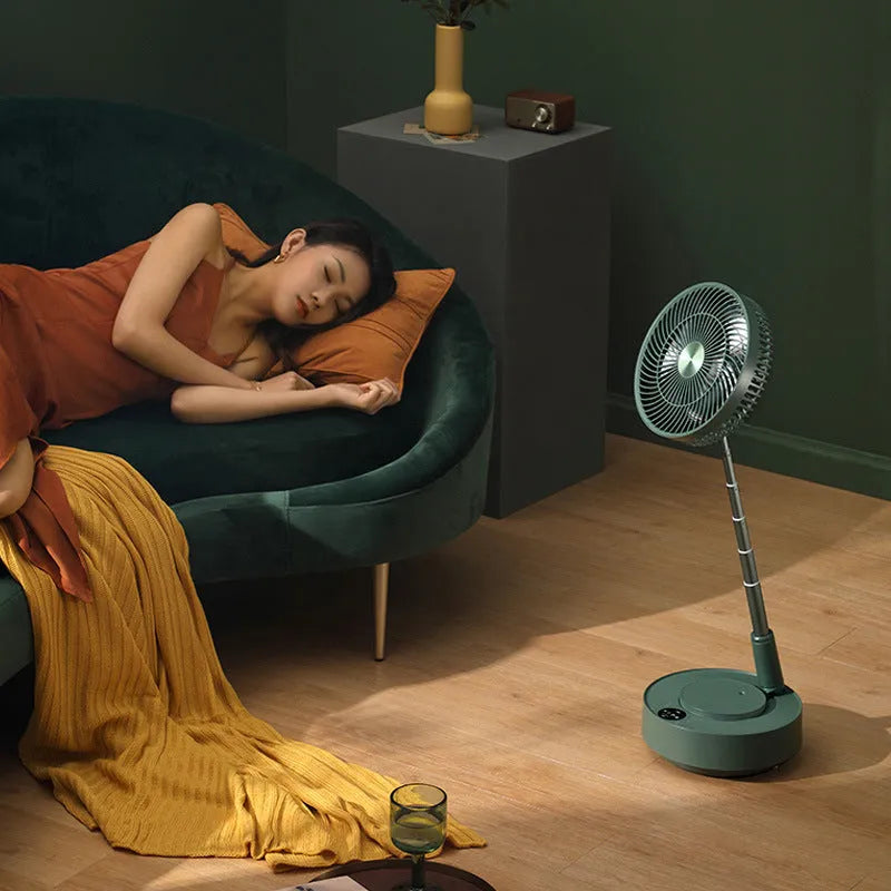 Green telescopic storage floor electric fan showing desktop and extended floor-standing configurations with remote control