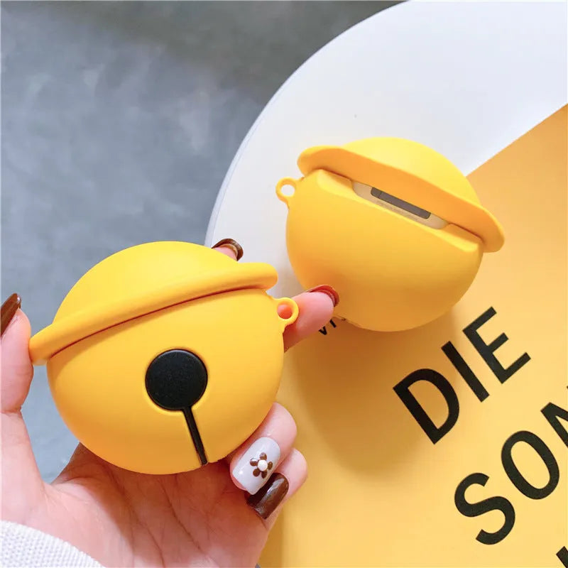Bright yellow silicone case for AirPods 1 and 2 with a small silver bell charm attached.