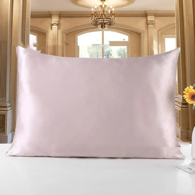 Double-sided silk pillowcase showing reversible design in apricot colour with three size options displayed
