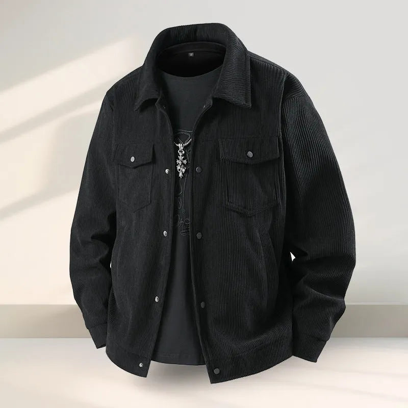 Man wearing a slim fit black casual coat with an American ruffle design detail.