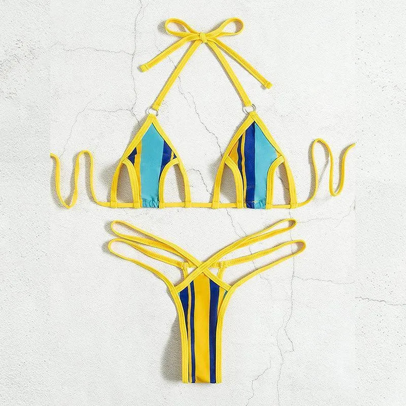 Yellow women's swimsuit with split skirt and hollow backless design.