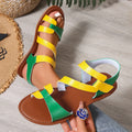 Women's black flat sandals with a Velcro strap, round toe, and rubber sole.