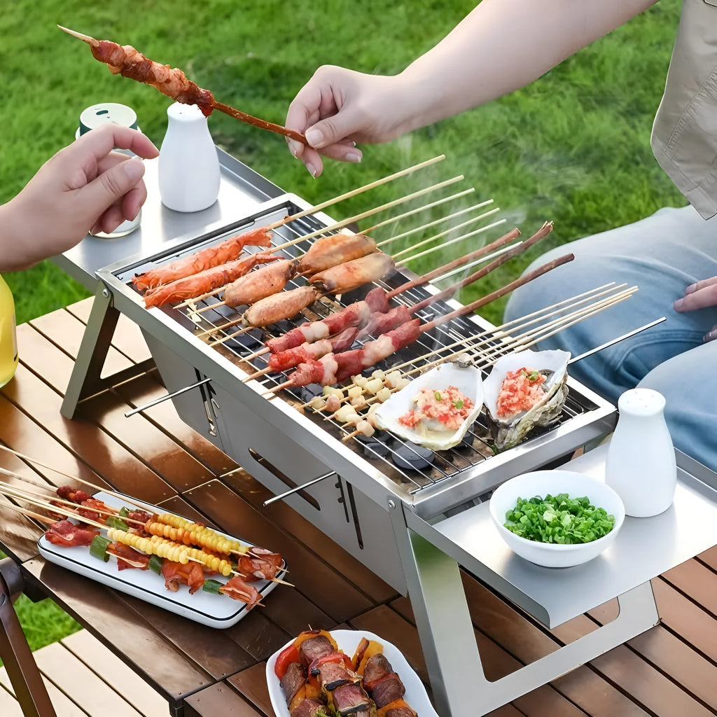 Small foldable portable charcoal grill for outdoor barbecues, shown in both open and closed positions.