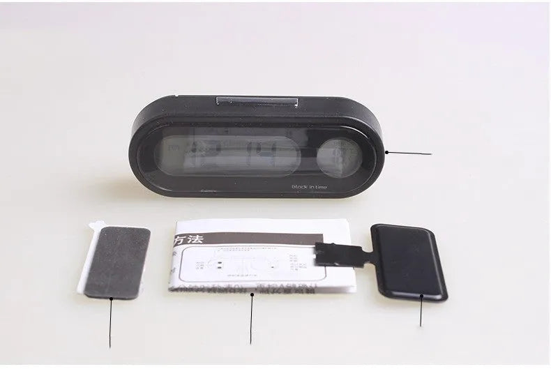 Black car electronic clock and thermometer with LED display on adjustable dashboard bracket