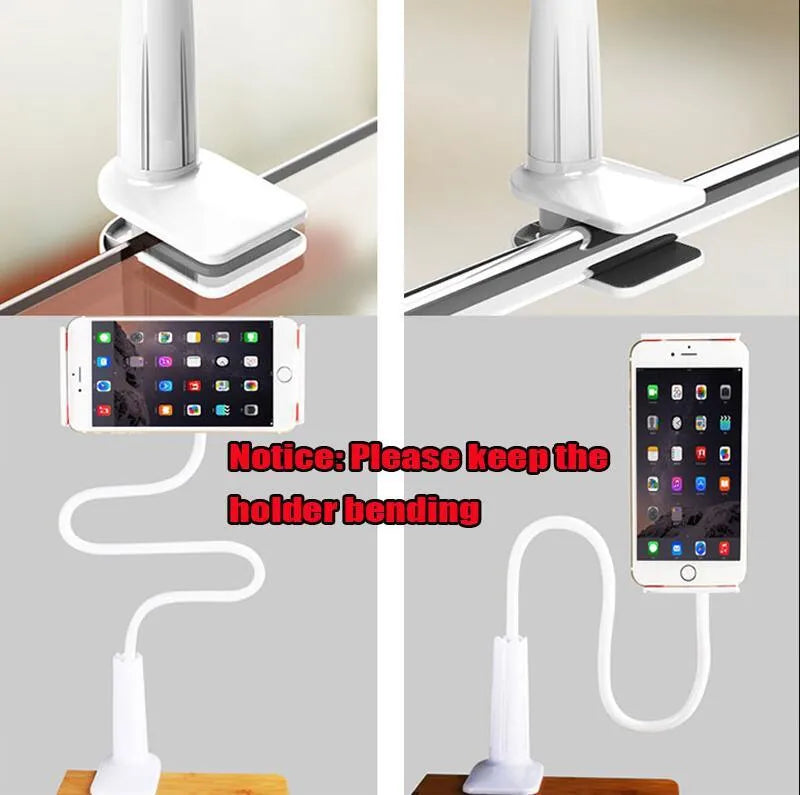 Black aluminium alloy phone holder with flexible arm on a wooden table holding a mobile phone.