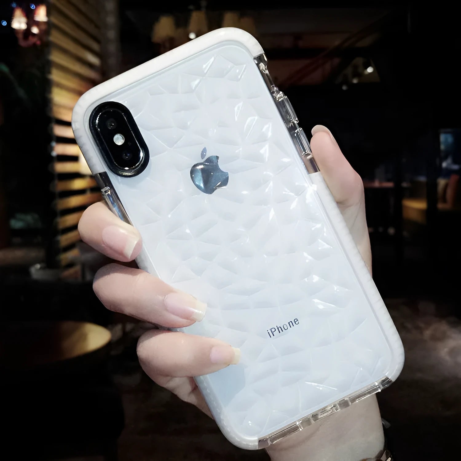 TPU iPhone case with striped pattern shown in pink with white edge detailing, compatible with multiple iPhone models