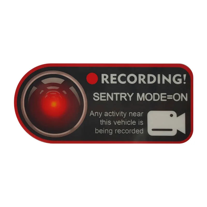 Pair of white electrostatic PVC warning stickers for Tesla car sentry mode, measuring 11 by 5 centimetres.