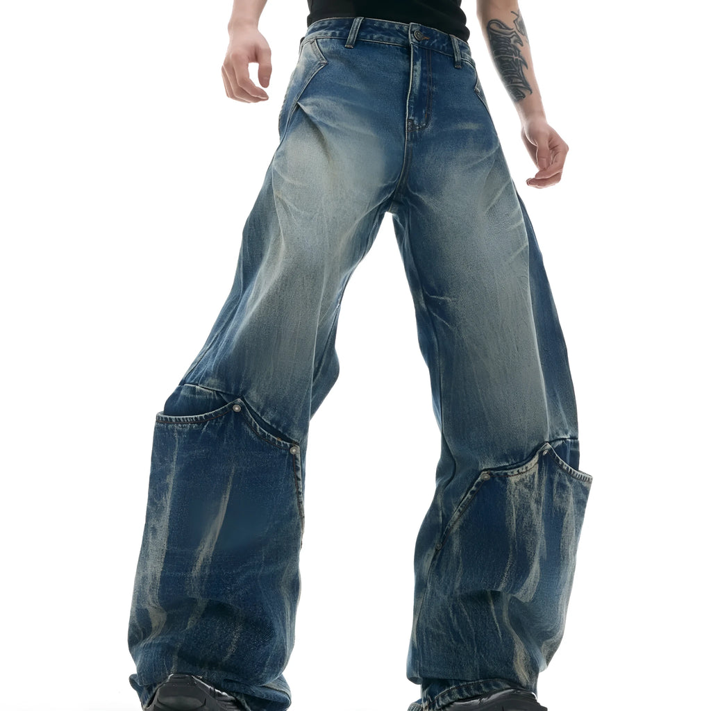 Men's verdant blue curved knife jeans with washed burst pattern and loose fit design