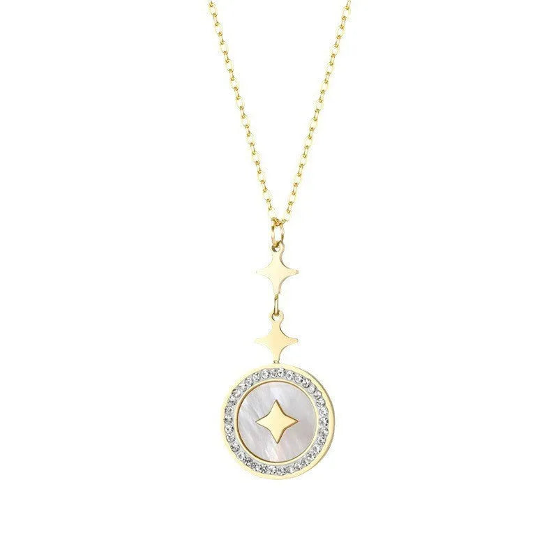 Gold titanium steel necklace with six-pointed geometric star pendant on an O-ring chain.