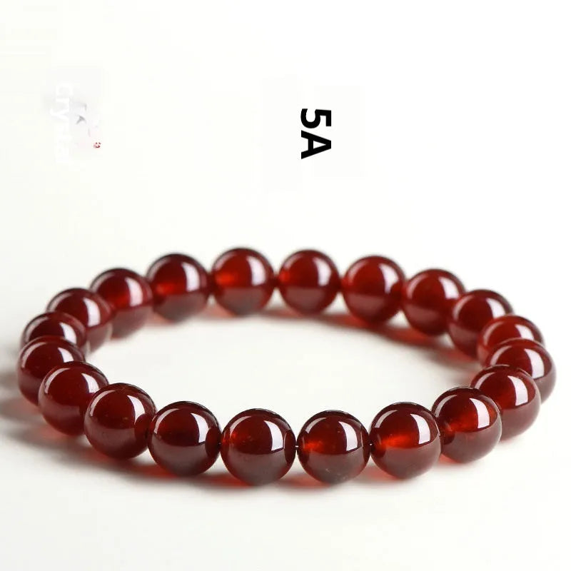 Natural orange red garnet crystal ball bracelet with retro Ruyi design and unisex styling