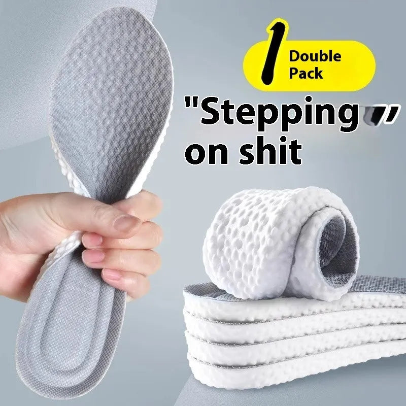 A pair of grey breathable PU sports insoles on a white background, showing a textured surface.