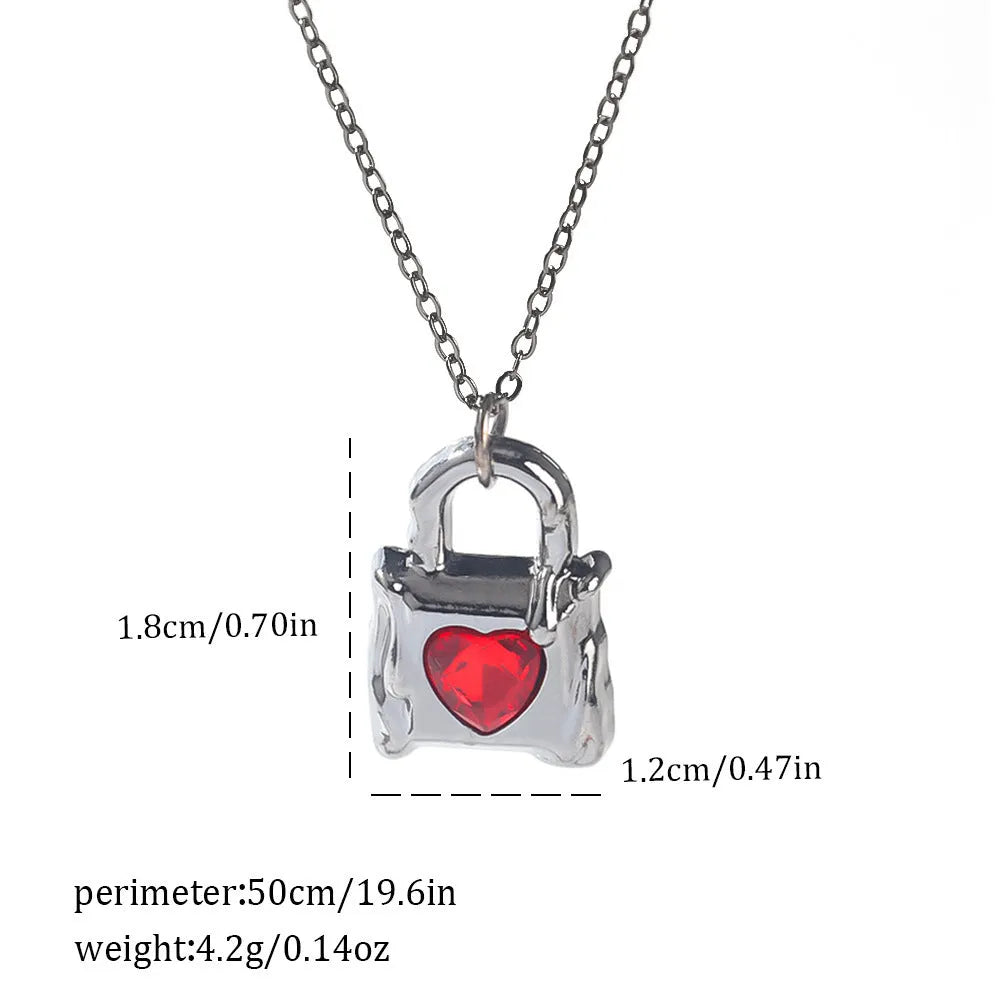 Dark Halloween necklace with zinc alloy electroplated pendant showing spider web and bat designs on regular chain