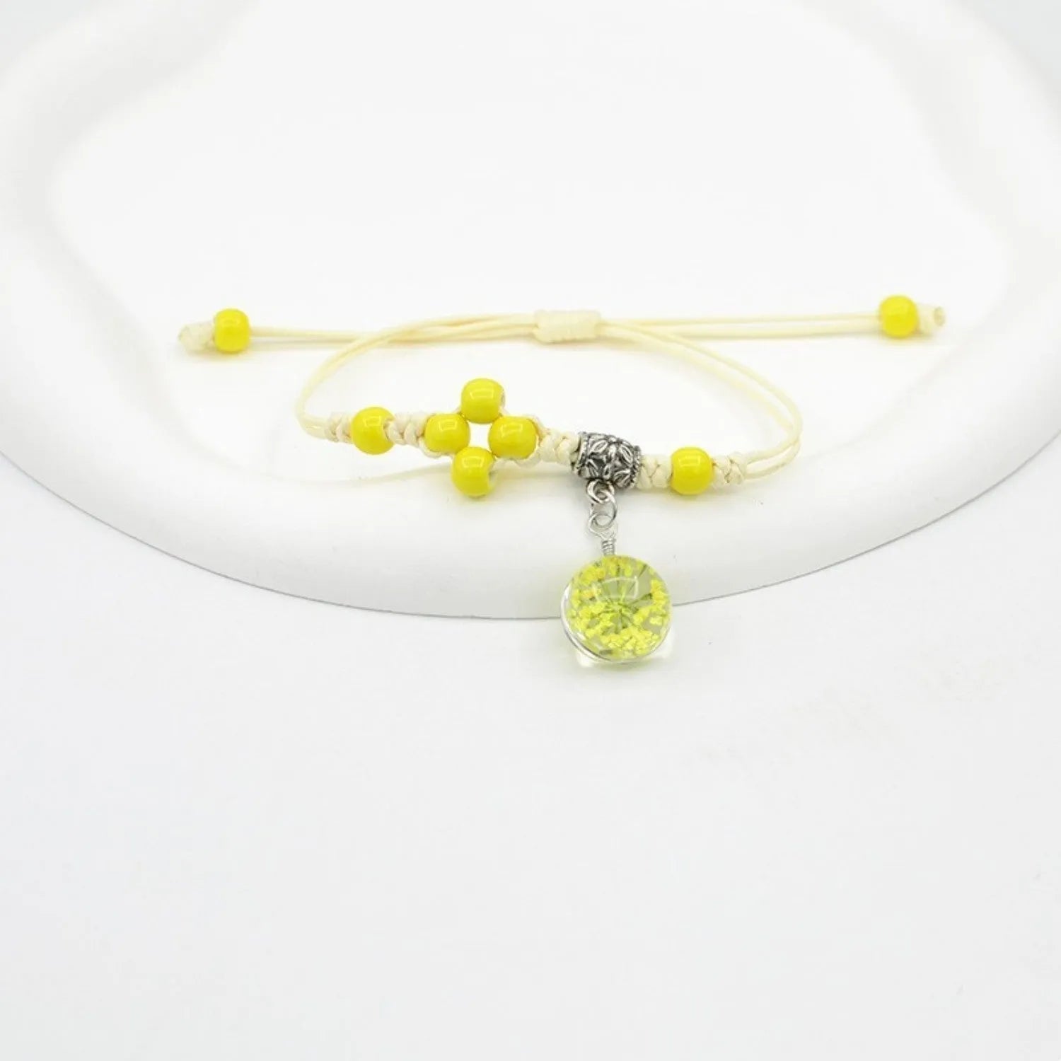 Glass dried flower bracelet with large 1.4cm beads containing real preserved flowers in hand-woven design