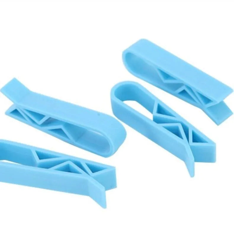 White plastic rubbish bag clip with adjustable 16mm jaws for securing bin liners.