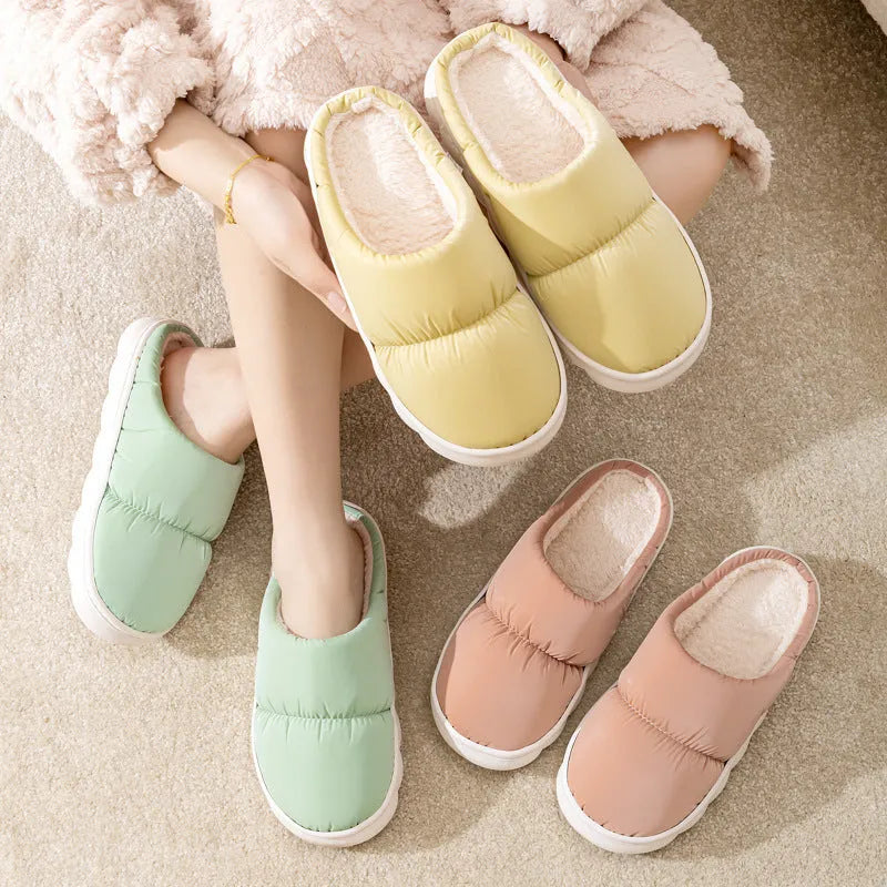 Thick-soled down cotton slippers with artificial leather upper and plush lining in blue green grey pink or yellow