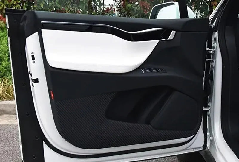 Carbon fibre protective film for Tesla Model S door interior control panels in 4-piece set