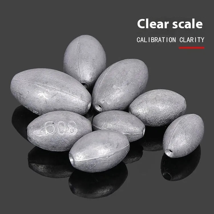 Olive green rugby-shaped fishing sinker with scale texture, showing plastic core construction and weight markings.