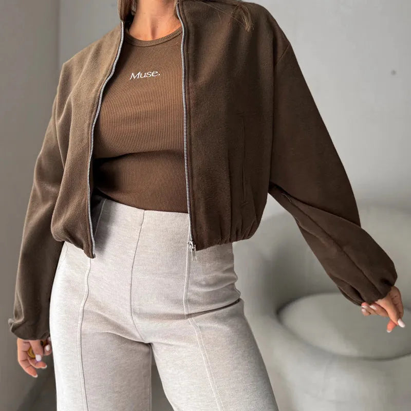 Women's loose-fitting off-shoulder coat with lantern sleeves in brown, showing front view.