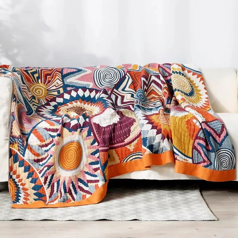 Pure cotton five-layer gauze bed blanket in modern simplicity style, shown in blue roulette wheel pattern.