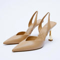 Women's patent leather high heels in apricot with pointed toe and shallow mouth design