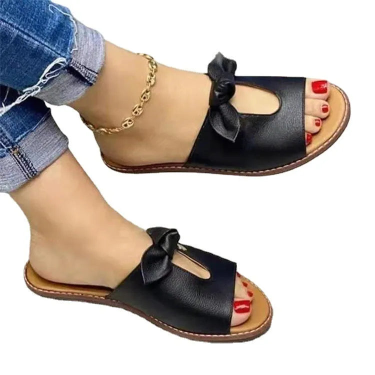 Ladies casual sandals with bow detail and fish mouth style in black, pink or gold